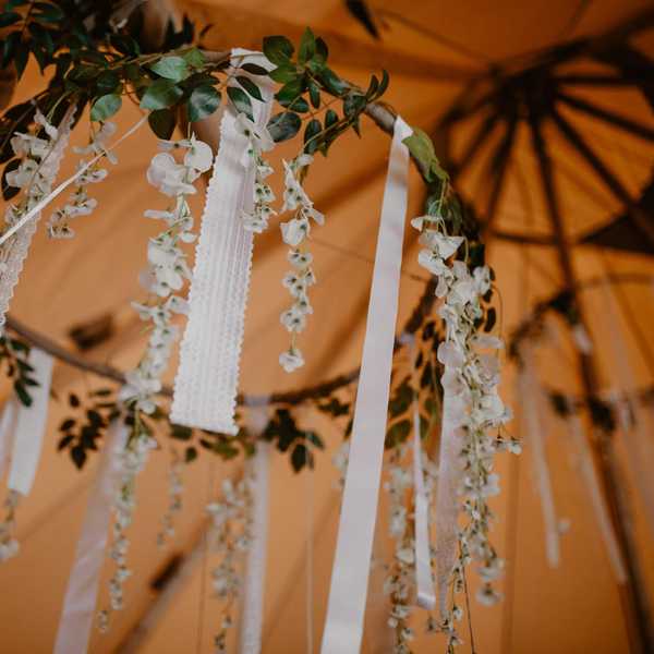 A wedding photo of a decoration inside the tipi venue